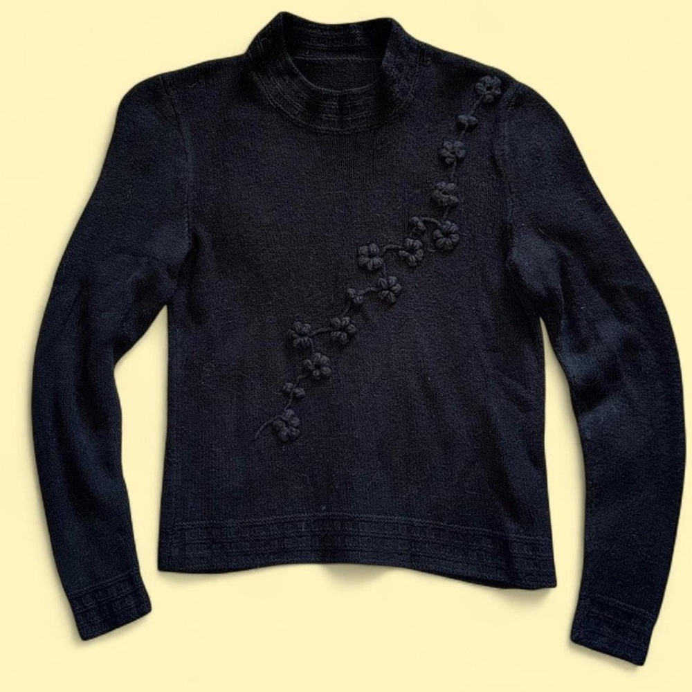 Elegant Black Sweater with Floral Detailing